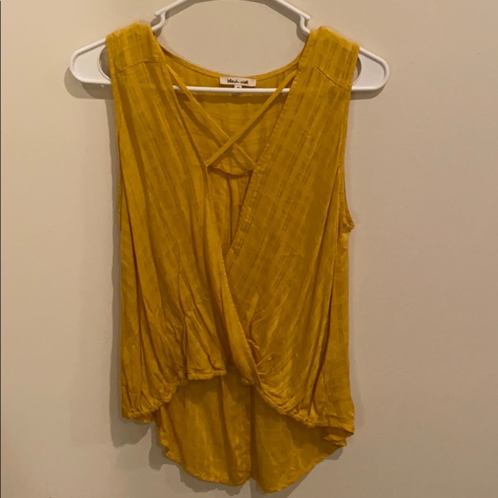 Yellow sleeveless top